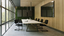 Black Aria lightweight stackable boardroom chair by Nautilus Designs, featuring a sleek modern design with a cushioned seat and backrest.