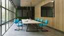 Lightweight Nautilus Designs Aria stackable boardroom chair with blue fabric upholstery and sleek modern design.