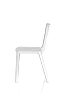 Dynamic Nest Edge Stacking Cafe & Bistro Chair shown in a stylish cafe setting, featuring a modern design with a wooden seat and metal frame.