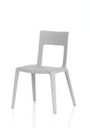 Dynamic Nest Edge Stacking Cafe & Bistro Chair in gray with a curved backrest and metal legs, suitable for outdoor or indoor seating.