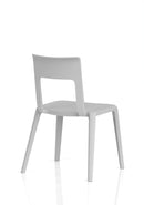 Dynamic Nest Edge stacking cafe and bistro chair with wooden seat and metal frame, shown stacked for space-saving storage.