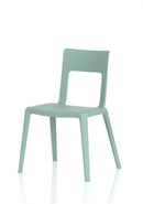 Dynamic Nest Edge stacking cafe and bistro chair in black with a curved metal frame and wooden seat, designed for outdoor or indoor use.