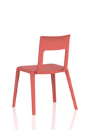 Dynamic Nest Edge stacking cafe and bistro chair with a sleek design, featuring a metal frame and comfortable seat.