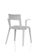 Dynamic Nest Edge stacking cafe and bistro chair with arms, featuring a sleek design and durable construction for indoor or outdoor use.