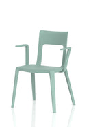 Dynamic Nest Edge stacking cafe and bistro chair with arms, featuring a modern design and comfortable seating.