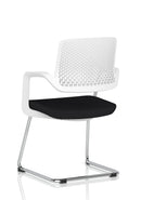 Modern Cosmo Cantilever Chair by Dynamic with a sleek metal frame and cushioned gray upholstery, shown from a side angle.