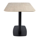 Extrema Premium complete dining table by ZAP with beige travertine tabletop and sleek Boston black base, modern and elegant design.