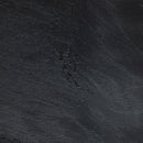 Close-up of the black moon Extrema Premium Table Top by ZAP showcasing its textured surface and sleek design.