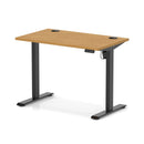 Dynamic Air Lite height adjustable slimline desk in oak with cable ports, featuring a modern design and sleek finish.