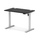 Black Air Lite height adjustable slimline desk by Dynamic with cable ports, featuring a sleek modern design for flexible workspace setup.