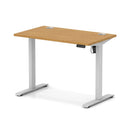Slimline oak desk by Dynamic with height adjustment and cable ports, featuring a sleek air lite design and modern workspace setup.