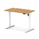 Dynamic Air Lite height adjustable slimline oak desk with cable ports, showcasing a modern ergonomic workspace.