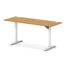 Dynamic Air Lite height adjustable slimline desk in oak with cable ports, featuring a modern design and sleek finish.