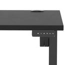 Black Air Lite height adjustable desk with cable ports by Dynamic, featuring a sleek design and ergonomic workspace.