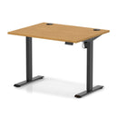 Dynamic Air Lite height adjustable desk with oak finish and cable ports, featuring a sleek modern design for versatile workspace setup.
