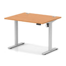 Dynamic Air Lite height adjustable desk with beech finish and built-in cable ports, featuring a sleek, modern design.