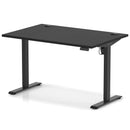 Black Air Lite height adjustable desk by Dynamic with cable ports and sleek modern design, shown in a home office setting.