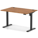 Dynamic Air Lite height adjustable desk in walnut finish with cable ports, featuring sleek design and ergonomic functionality.