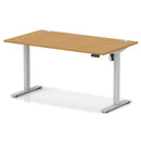 Dynamic Air Lite height adjustable desk in oak with cable ports, showcasing its modern design and ergonomic features.