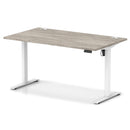 Dynamic Air Lite height adjustable desk with cable ports, featuring a grey oak finish and modern design.