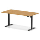 Dynamic Air Lite height adjustable desk in oak finish with cable ports, featuring sleek, modern design and ergonomic features.