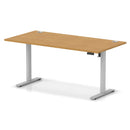 Dynamic Air Lite height adjustable desk with oak finish and cable ports, featuring a modern ergonomic design.