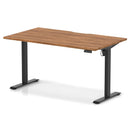 Dynamic Air Lite height adjustable desk with scalloped walnut edge, showcasing its modern design and smooth height adjustment mechanism.