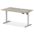 Dynamic Air Lite height adjustable desk with scalloped edge in grey oak finish, featuring a sleek modern design.
