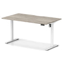 Dynamic Air Lite height adjustable desk with scalloped edge in grey oak finish, featuring sleek modern design and smooth height adjustment.
