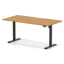 Dynamic Air Lite height adjustable desk with scalloped oak edge, showcasing a modern workspace with sleek wood finish.
