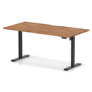 Dynamic Air Lite height adjustable desk with scalloped walnut edge, showcasing sleek design and adjustable features.