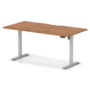 Dynamic Air Lite height adjustable desk with scalloped edge in walnut wood finish, featuring modern design and adjustable height.