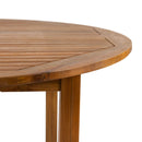 Close-up of the ZAP Hardy round dining table showing its 110cm diameter wooden tabletop and modern design details.