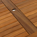 Close-up of the ZAP Hardy rectangle dining table with detailed wood surface and side chairs in a modern outdoor dining set.