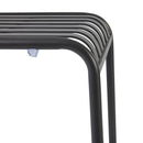 Charcoal grey ZAP Henley stacking side chair with a modern design and wooden legs, shown from a side angle.