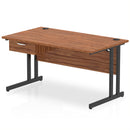 Dynamic Impulse cantilever straight desk with one drawer pedestal in walnut finish, showing the clean-lined workspace and sturdy frame