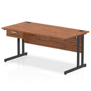Dynamic Impulse cantilever straight desk with single drawer pedestal in walnut wood finish, showcasing a modern office workspace.