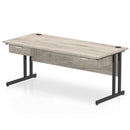 Gray oak Impulse cantilever straight desk by Dynamic with two fixed pedestals and one drawer for modern office workspace.