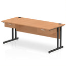 Impulse cantilever straight desk with two fixed pedestals in oak by Dynamic, showing a modern office workspace setup.