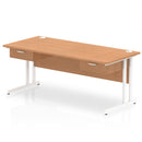 Dynamic Impulse cantilever straight desk in oak with two one-drawer fixed pedestals, showcasing a modern office workspace.
