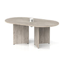 Impulse Volta Boardroom Table by Dynamic with grey oak finish and arrowhead legs, featuring a pop-up power module.