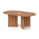 Dynamic Impulse Volta Boardroom Table with Walnut finish and arrowhead legs featuring pop-up power module, shown from side view.
