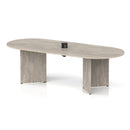 Dynamic Impulse Volta Boardroom Table with Grey Oak finish, arrowhead legs, and pop-up power module for conference rooms.