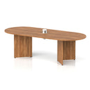 Impulse Volta boardroom table with walnut finish, arrowhead legs, and integrated pop-up power module, by Dynamic.