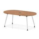 Dynamic Impulse Volta boardroom table with walnut surface, silver leg frame, and built-in pop-up power module for meetings.