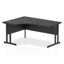Black Impulse Crescent Desk by Dynamic with cantilever legs, showcasing a modern office workspace design.