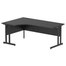 Black Impulse Crescent Desk with cantilever legs by Dynamic, showing modern workspace with sleek black surface and sturdy leg design.