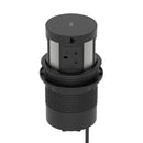Dynamic Volta round pop-up power unit with four sockets and wireless charger, 120mm, installed in a sleek surface.