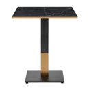 Omega complete dining table by ZAP with black marble tabletop and sleek black and gold square base, modern and elegant design.