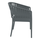 Dark grey ZAP Portofino stacking armchair viewed from the side, showcasing its modern design and comfortable armrest.